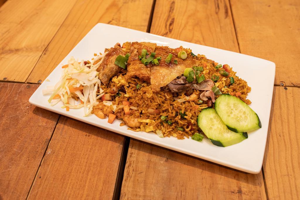 Mixed Fried Rice · Specialty Fried Rice, Stir Fried With Pork, Shrimp. Eggs, Mixed Vegetables & Topped With Traditional Fried Chicken