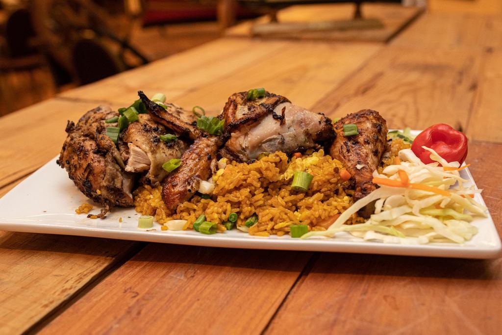 Jamaican Jerk Chicken · Open Fire Roasted Chicken, Marinated In Our Signature Blend Of Jamaican Spices.