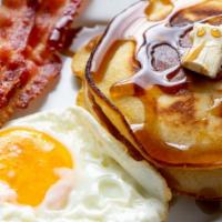 Bacon Pancakes · Fluffy, buttery, light, buttermilk pancakes and crispy bacon. Served with real butter and ma...