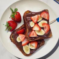 Le Nutella French Toast · So amazing, it belongs in the Louvre. Classic French toast slathered with gooey Nutella and ...
