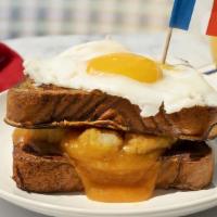Le Sausage, Egg, And Cheese French Toast Sandwich · So good, it’ll have you wondering why the Eiffel Tower isn’t made out of sausage links. Saus...
