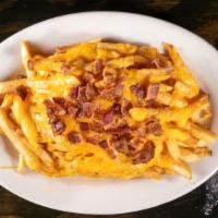 Loaded Fries · Melted cheddar cheese & chopped bacon bits. Served with ranch dressing