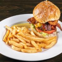 Cowboy Burger · Bacon, cheddar cheese, onion ring & BBQ sauce