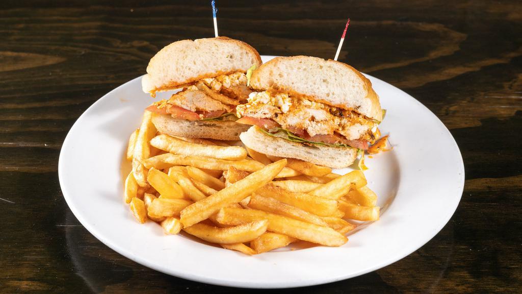 Buffalo Chicken · Grilled chicken tossed in our award-winning buffalo Sauce w/ lettuce, tomato & bleu cheese crumbles