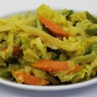 Atkilt · Mild. Cabbage, green beans, carrots & potatoes simmered in Ethiopian curry sauce