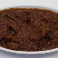 Siga Wat · Spicy. Cubed prime beef slow-simmered in a spicy stew of berebre, clarified spiced butter an...