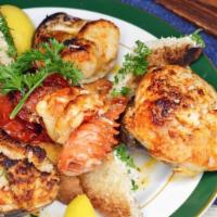 Seafood Combination · Shrimp, scallops and filet of sole.