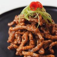 Sichuan Shredded Beef · Crispy beef juliennes in a sweet chili glaze.