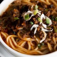 Hutong Dan Dan Noodles · Sichuan classic dish served in a spicy minced pork, sesame, and peanut broth. (Individual po...