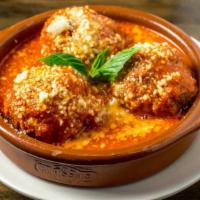 Polpette Al Sugo · Three pieces. Meatballs in tomato sauce.