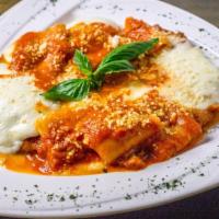 Pollo Parmigiana · Chicken cutlet, tomato sauce, homemade mozzarella, and parmigiano reggiano. No pasta.