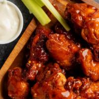 The Mango Habanero Wings · The crispiest, golden wings ever. Tender and juicy on the inside and tossed with the fruity,...