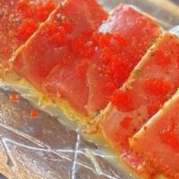 Pepper Tuna · Thinly sliced seared tuna with ponzu sauce.