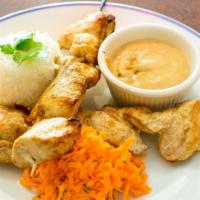 Chicken Satay · With spicy peanut sauce, jasmine rice, carrot salad