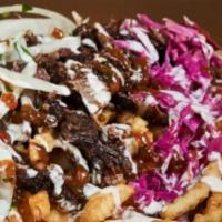 Döner Fry Box · All the fixings served over french fries. 

Can be made Vegan or Gluten-free.