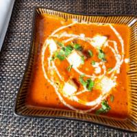 Shahi Paneer · Cottage cheese cooked in a rich tomato gravy.