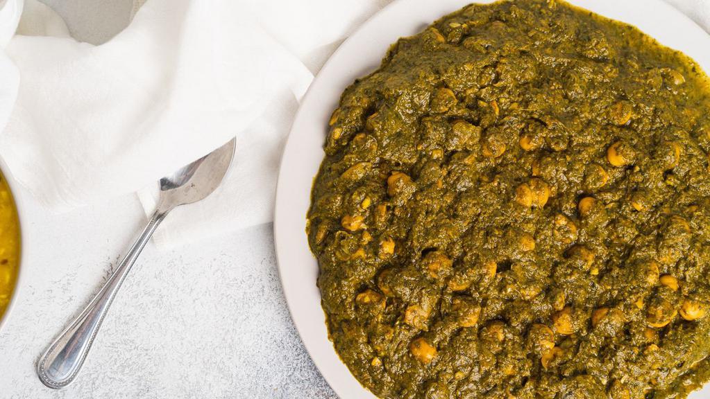 Saag Chana · Finely chopped garden fresh spinach cooked with homemade cottage cheese or chickpeas and delicate spices.