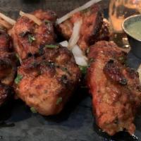 Hariyali Chicken Tikka · Chunks of chicken marinated with cilantro mint and parsley cooked in tandoori.