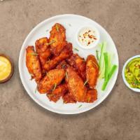 Wing It Classic · Fresh chicken wings breaded and fried until golden brown. Served with a side of ranch or ble...