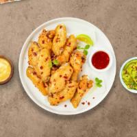 Sweet And Chili Thrill Wings	 · Fresh chicken wings breaded, fried until golden brown, and tossed in sweet chili sauce. Serv...