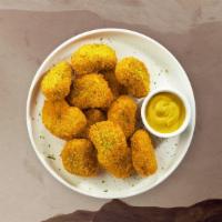 Nugget Nook · Bite sized nuggets of chicken breaded and fried until golden brown. Served with your choice ...