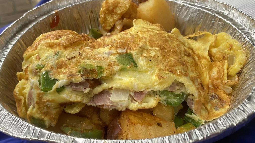 Western Omelette · Ham, onion and peppers. Served with home fries and toast.