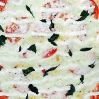 Margherita Pizza · Fresh basil, plum tomatoes and olive oil.