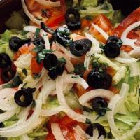 Tossed Salad · Lettuce, tomatoes, olives, onions, oil and vinegar.