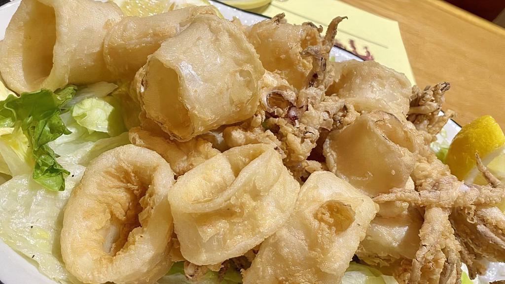 Fried Calamari  · Served with House salad