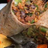 Vspot Carne Molida Burrito · Seasoned ground seitan molida, Colombian beans, Mexican yellow rice, sour cream, salsa roja,...