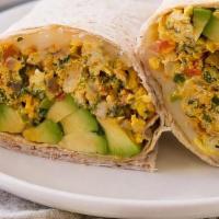 Scrambled Egg Burrito · Colombian plant based egg scramble (gf), Mexican rice, Colombian red beans, cheese, spicy av...