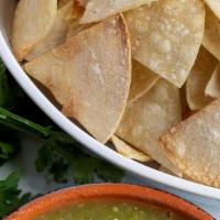 Tri-Flavored Chips & Salsa · Our spicy Mexican salsa verde with tri-flavored crisp wheat chips. No Gluten Free