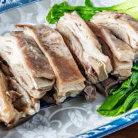 手抓羊肉Mutton On The Bone · Lamb ribs with bones special seasonings of chili powder and coarse sea salt
