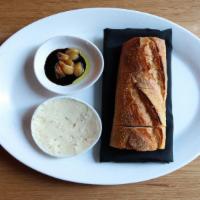 Bourke Street Bakery Baguette · fennel honey butter, roasted garlic in aged balsamic.
