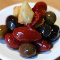 Marinated Olives · castelvetrano & cerignola olives, citrus, chili, roasted garlic.