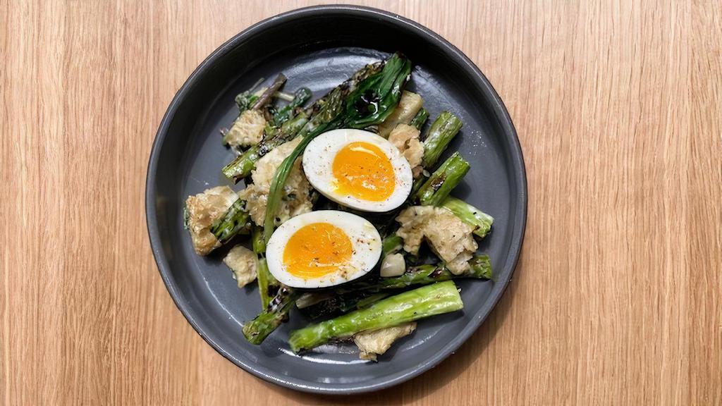 Grilled Asparagus · soft cooked egg, spring onion, vinaigrette, torn crouton.