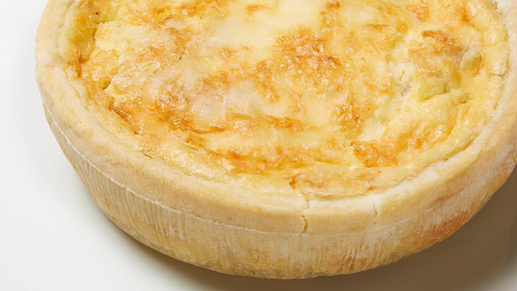 Quiche Loraine  · Crust filled with choice of Emmental cheese and bacon.