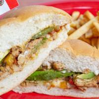 Mexican Torta · Chicken, steak, and chicken a la milanesa on a toasted mexican roll with guacamole, mayonnai...