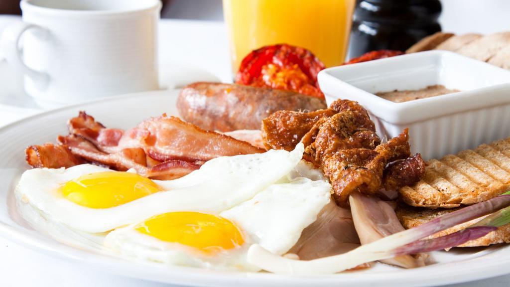 Breakfast Platter With Bacon · Fresh eggs, crispy bacon, home fries, and toast.