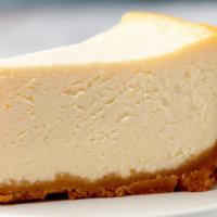 New York Cheesecake · New York style cheesecake topped with our delicious frosting.