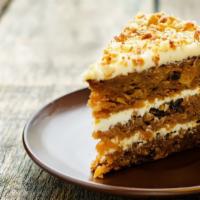 Carrot Cake · Moist and rich carrot cake topped with our delicious frosting.