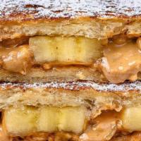 The Pbbh · Choice of crunchy or smooth peanut butter, sliced banana, honey drizzle, topped with powdere...