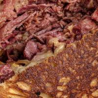 The Pastrami · Mozzarella cheese with lean sliced pastrami and caramelized onions with our house made speci...