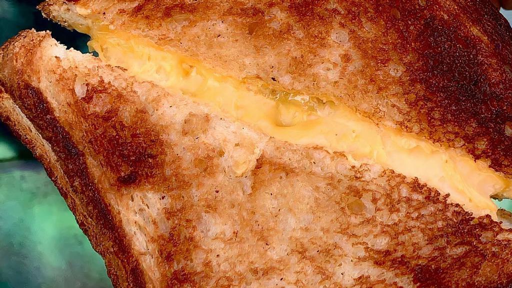 The Og · Classic all-American grilled cheese on jumbo white bread.