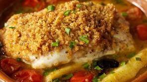 Merluzzo Al Forno · Hake fillet baked in salmoriglio with fingerling potatoes, black olives, little tomatoes, ba...
