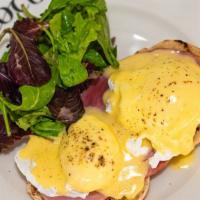 Eggs Benedict · English Muffin, Canadian Bacon, Champagne Hollandaise Sauce.