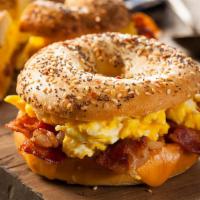 Bacon Egg & Cheese · 2 eggs scrambled with bacon and cheese served on a roll.