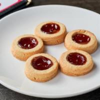 Strawberry Cookies · Shortbread cookies with strawberry jam filling.  Five cookies for $4.00.