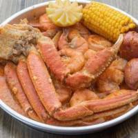 Snow Crab And Headless  · 1 LB of Each. Comes with Potatoes and Corn.