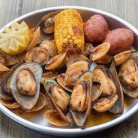 Green Mussels And Clams · 1 LB of Each. Comes with Potatoes and Corn.